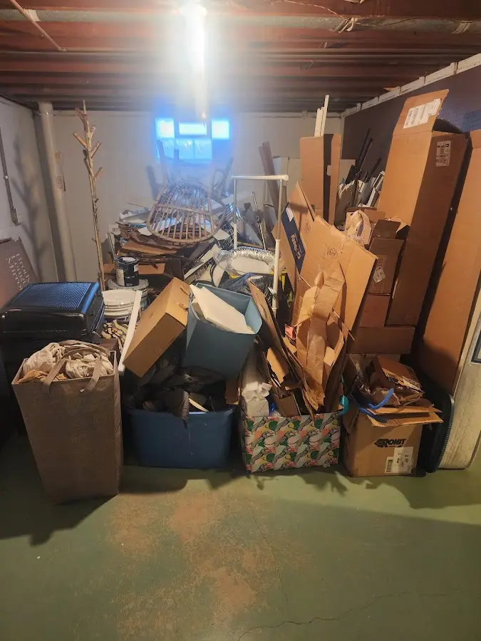 Roll-off dumpster container at job site for Construction Dumpster Rental in Merrill